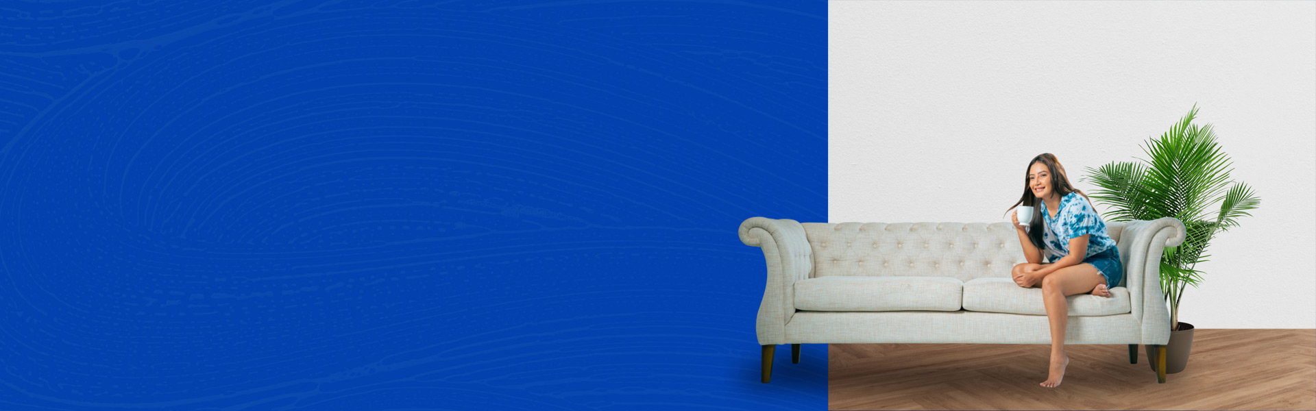 girl-sitting-on-couch-holding-mug